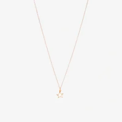 Alternative view of Ciondolo stellina in oro rosa e smalto cattedrale.